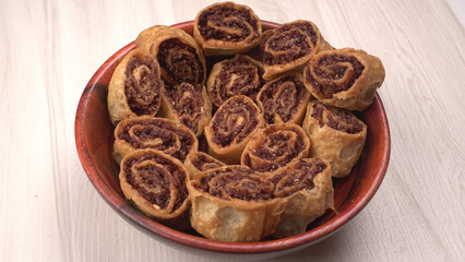 Indian traditional Snacks Bhakarvadi or Bakarvadi. Diwali snacks Bhakarwadi, selective focus.