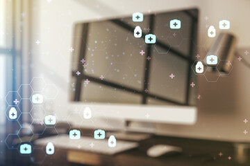 Double exposure of creative abstract medical hologram on laptop background. Healthcare technolody concept