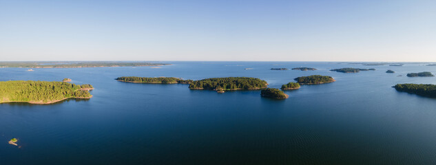 Aerial view of clean nordic nature. Beautiful rocks and island with woods in North Europe, Baltic...