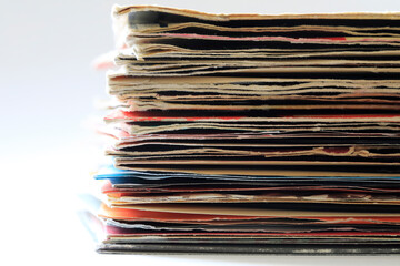 Stack of old vinyl singles in original sleeves