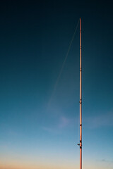 A fishing rod standing at a Bay
