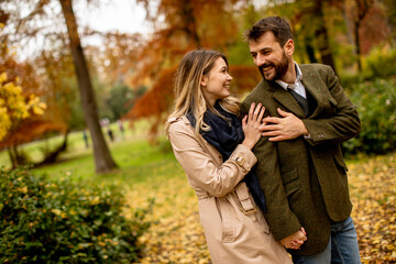 Young couple in the autumn park