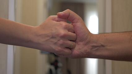 The boy and girl holding hands