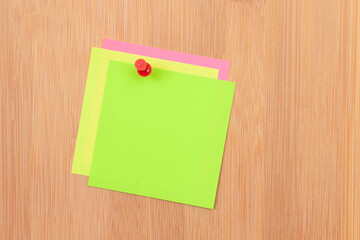 Colored Sticky Notes with Copyspace Pinned to the Wooden Message Board. To Do List Reminder in Office. Blank Memo Sticker at Work - Template. Empty Checklist - Mockup