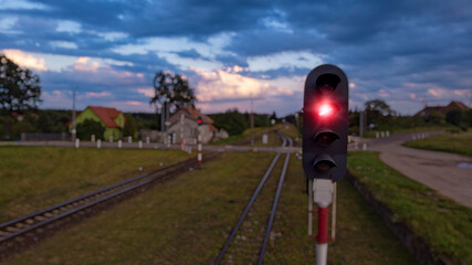 stop sign on a railroad track