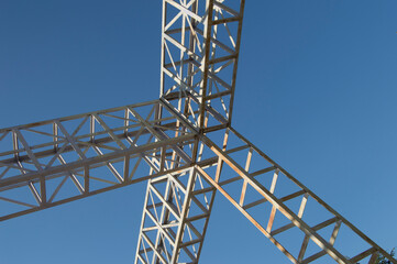 metal wireframe isolated on blue sky background in a park