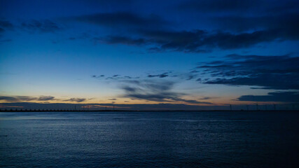 Fototapeta na wymiar half cloudy north sea sunset 