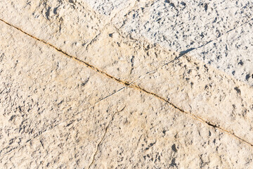 stone background with envelope-shaped cracks