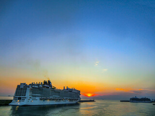 cruise ship arriving to Civitavecchia port at sundown, Lazio, Rome, Italy, Europe