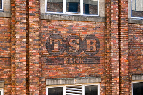 Chester, Cheshire, England - July 2021: Old faded sign painted onto brickwork on the outside of the offices of the TSB Bank