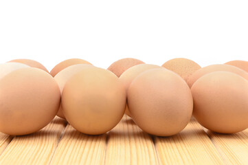 eggs on wooden floor with white background