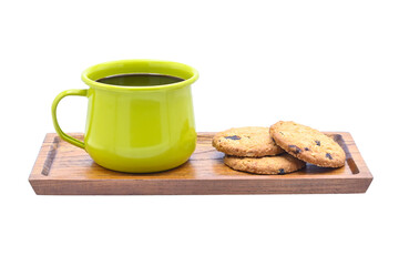 black coffee in green metal cup and oat creckers on a wooden tray  and on a white background (...