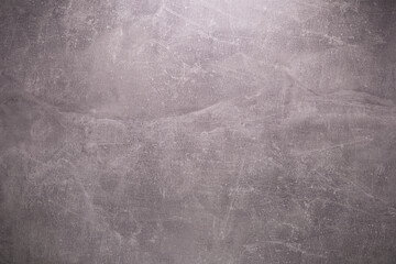 Abstract painted gray background texture. Front view of grey chipboard