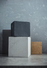 Concrete cube or construction brick as abstract background texture