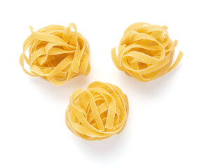 Pasta tagliatelle isolated on white background. Raw pasta italian food - 448412212