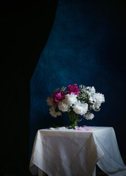 Artistic still life with flowers, minimalist interior, suitable for advertising cosmetics and jewelry