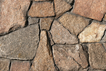 Obraz premium Stone wall of granite close-up, texture, background