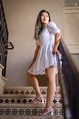 Portraits of Young Asian Woman on Mexican Tile Stairs with Brass Railing