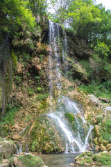 Fototapeta na wymiar Gostilje waterfall is a place that tourists like to visit. It is located on the mountain Zlatibor.