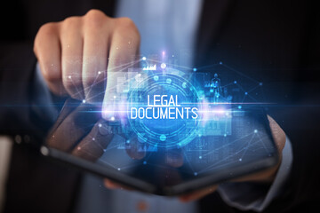 Naklejka premium Young man holding a foldable smartphone