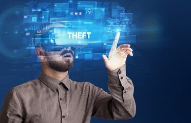 Businessman looking through Virtual Reality glasses