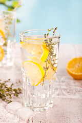 Summer cold fresh lemonade with herb thyme and lemon