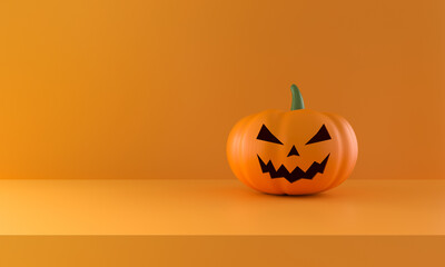 Halloween pumpkin on orange studio background.