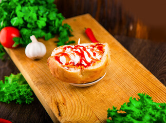 Hotdog with meat and sauce