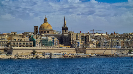 Fototapeta na wymiar The fortified city of Valletta facing Marsamxett Harbour.