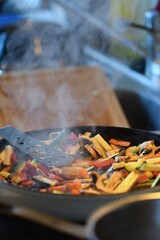 Photo of food being cooked in kitchen