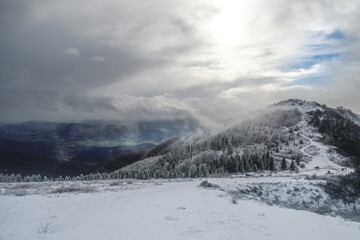 Fototapeta na wymiar Snowstorm on Mount Kolitza