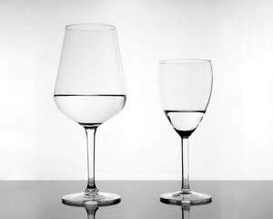glass cups with water in black and white 