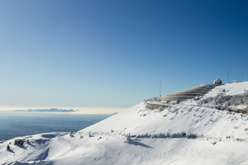 Fototapeta na wymiar Mountain winter landscape. Mount Grappa with snow