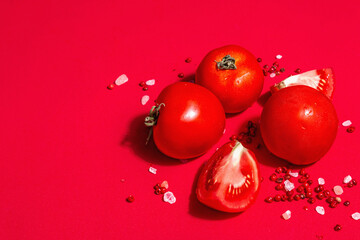 Ripe tomatoes with rose Himalayan salt and pink peppercorn