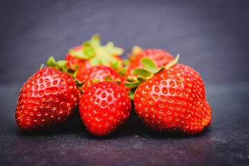Group of strawberries on a black background