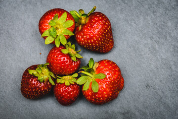 Strawberries on a grey background
