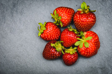 Strawberries on a grey background