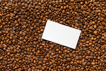 Coffe beans mockup with empty white paper card for your text or design. Coffee template.