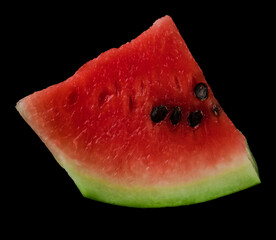 Piece of ripe watermelon on black background isolated