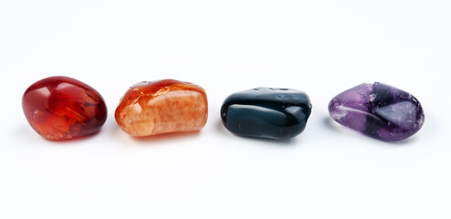 different colorful Semi Precious stones on white background