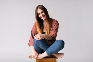 Young caucasian woman posing in studio