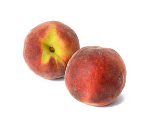 two ripe red peaches isolated on white background