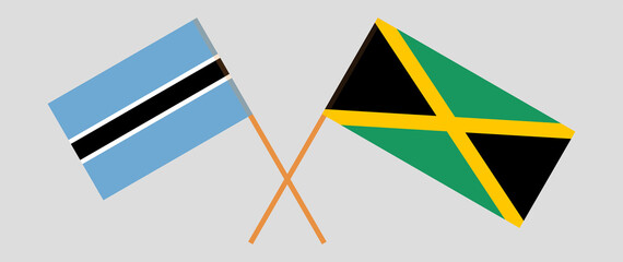 Crossed flags of Botswana and Jamaica. Official colors. Correct proportion