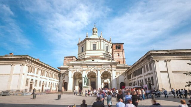 Facade of San Lorenzo Maggiore Basilica in Milan City Italy timelapse hyperlapse(Saint Lawrence the Major Cathedral) and statue of Constantine emperror in front. Milano Italy video.