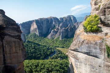 Monasteries built on cliffs, Meteora on a hot summer day, Greece