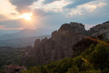 Fototapeta na wymiar Monasteries built on cliffs, Meteora at sunset, Greece