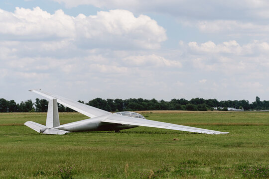 Single glider on the airfield waiting to go into the air. Aircraft for active extreme sport.