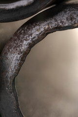 Background of fragments of rusted metal pipes close-up. Industrial abstract background.