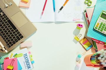 white table with workbook at school child room in sunny day