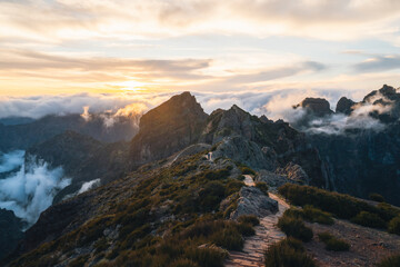 Scenic view on the trekking path from Pico Arieiro to Pico Ruivo during sunset in Madeira Portugal. High quality photo